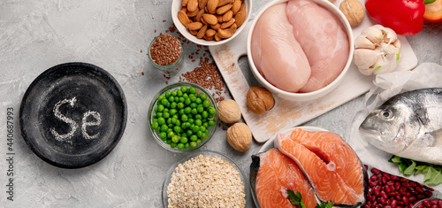 Food high in selenium on light gray background. Healthy eating concept.