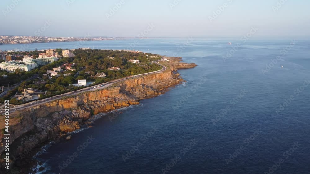 AERIAL Orbiting Shot of a Rocky Cascais Coastline in Portugal AERIAL Orbiting Shot of a Rocky Cascais Coastline in Portugal