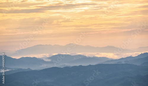 Surreal landscape of morning foggy..Morning clouds at sunrise.Landscape of fog and mountains of northern laos © gexphos