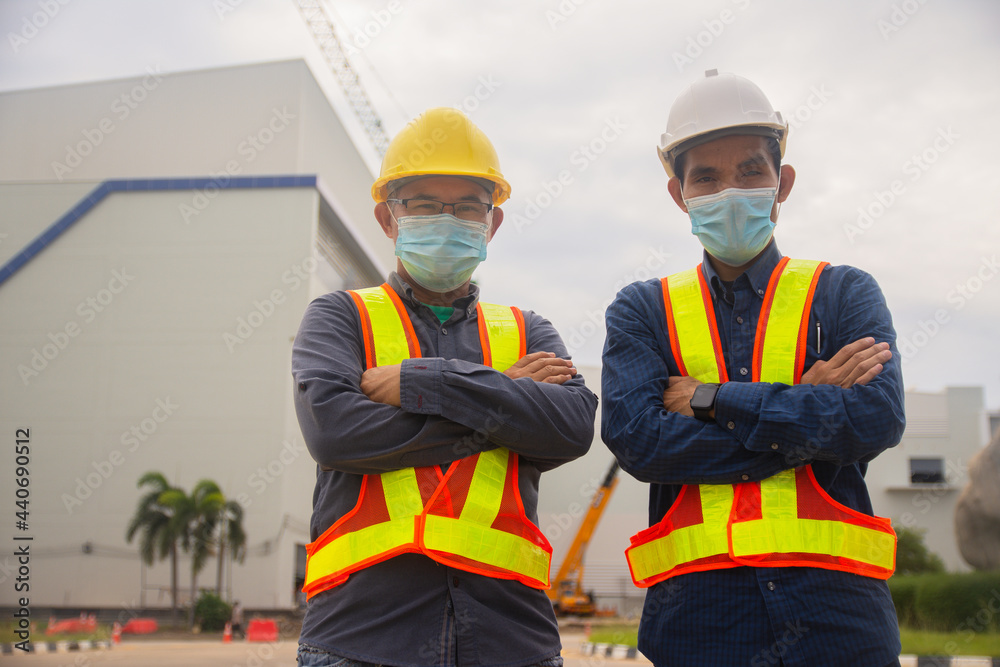 Fototapeta premium two engineer work smart on site building construction