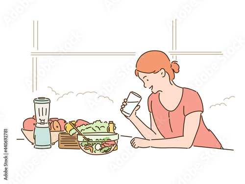 A woman is drinking water and a salad is on the table. hand drawn style vector design illustrations. 