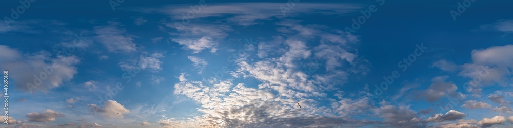 Fototapeta premium Blue sky panorama with Cirrus clouds in Seamless spherical equirectangular format. Full zenith for use in 3D graphics, game and editing aerial drone 360 degree panoramas for sky replacement.
