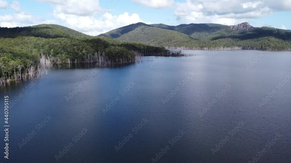 Flying over a beautiful lake towards the mountain Flying over a beautiful lake towards the mountain