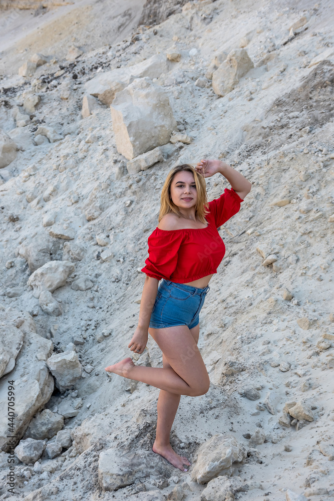 beautiful girl walking on the sand with blue sky beautiful girl walking on the sand with blue sky