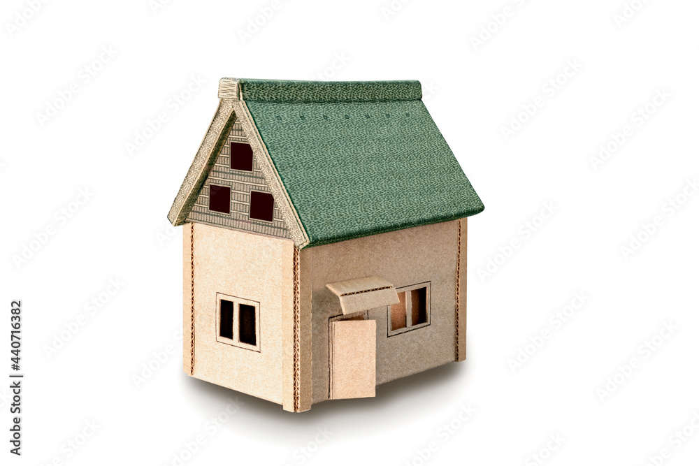 Model of the house isolated on white background. Concept for real estate advertising. Buying, selling renting a house.