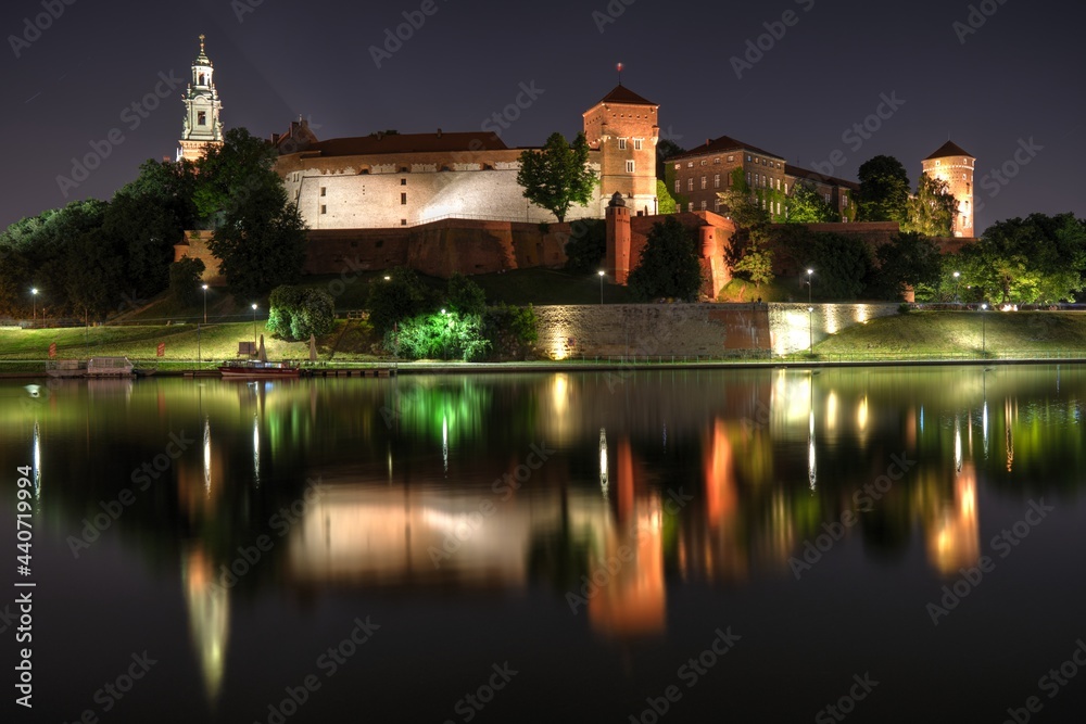 Wawel Castle in Krakow, Vistula boulevars in the night