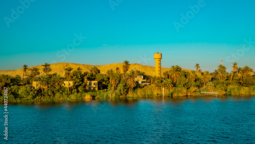 Photos Horizontal Panorama view of a traditional town on the Nile River near Luxor, Egy