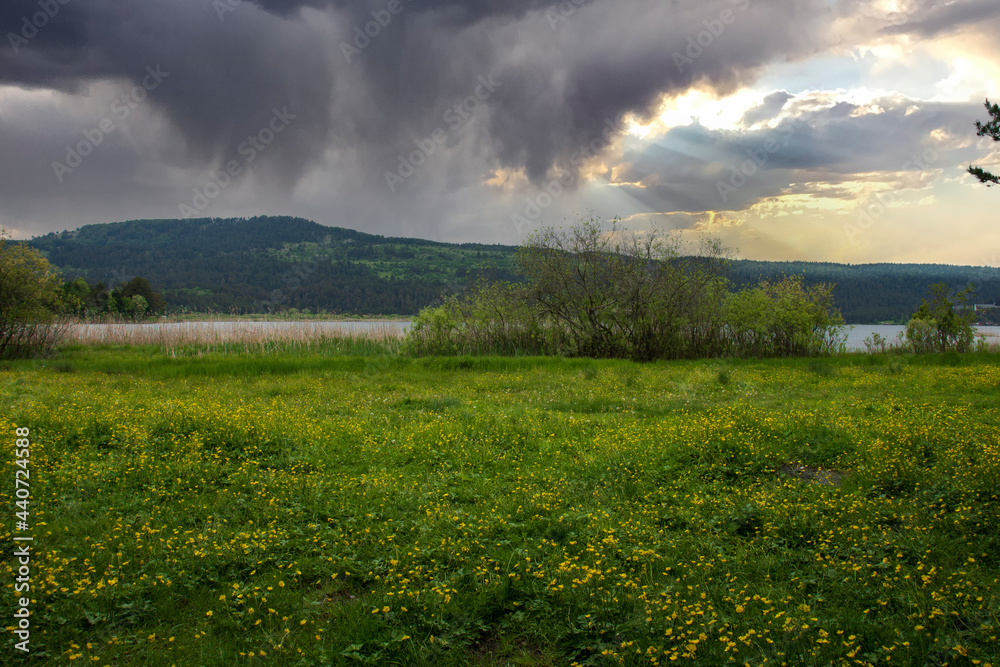 Bolu, by the Abant Lake, mountain view from the lake shore covered with meadows and reeds