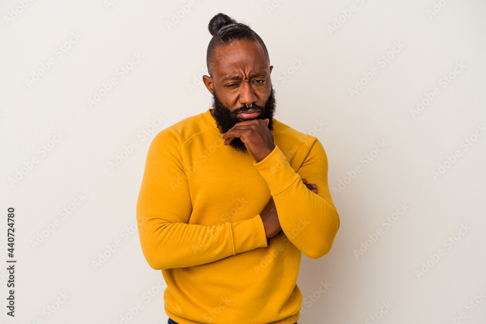 African american man with beard isolated on pink background thinking and looking up, being reflective, contemplating, having a fantasy. African american man with beard isolated on pink background thinking and looking up, being reflective, contemplating, having a fantasy.