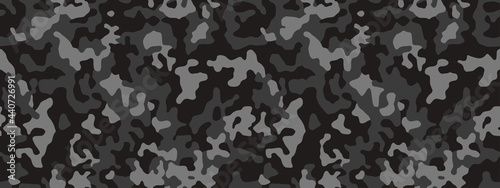 Camouflage pattern background, seamless vector illustration. Classic clothing style masking dark camo, repeat print.  Black texture