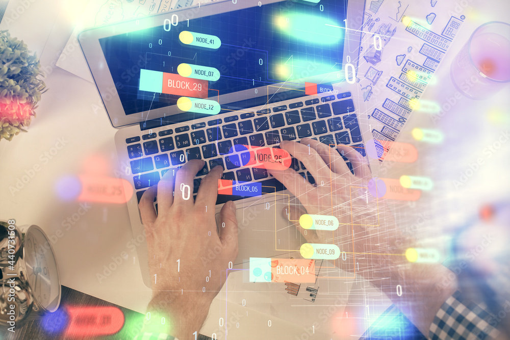 Multi exposure of man's hands typing over computer keyboard and data theme hologram drawing. Top view. Technology concept. Multi exposure of man's hands typing over computer keyboard and data theme hologram drawing. Top view. Technology concept.