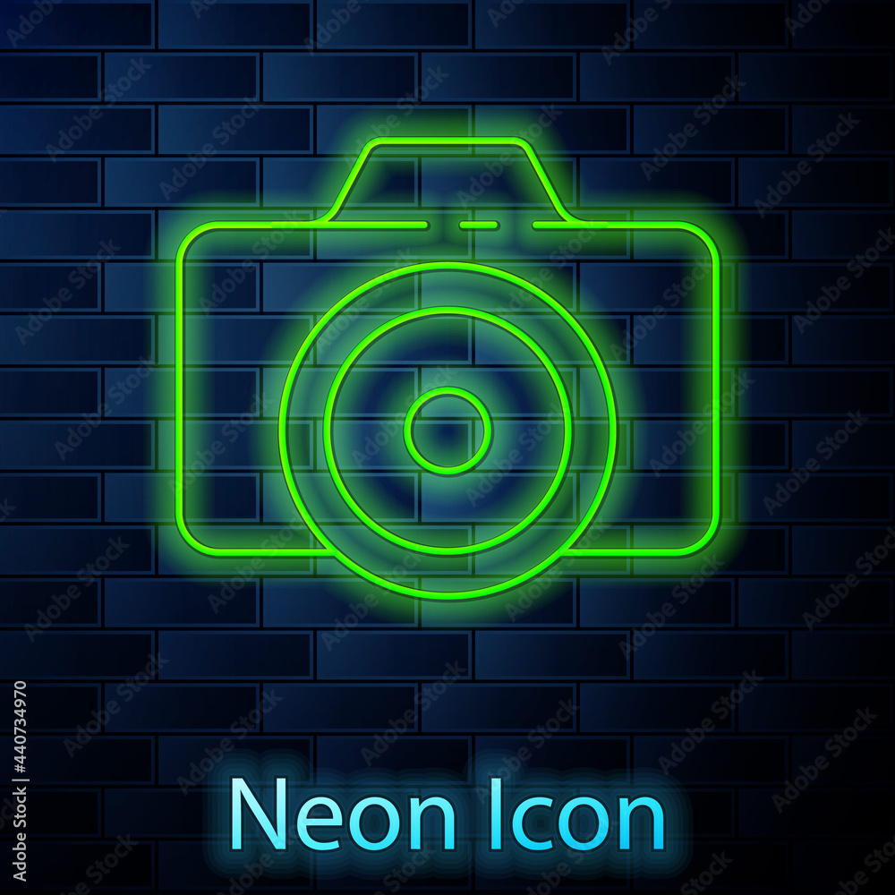 Glowing neon line Photo camera icon isolated on brick wall background. Foto camera icon. Vector Illustration Glowing neon line Photo camera icon isolated on brick wall background. Foto camera icon. Vector Illustration