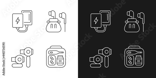 Traveller luggage linear icons set for dark and light mode. Compact powerbank and headphones. Customizable thin line symbols. Isolated vector outline illustrations. Editable stroke