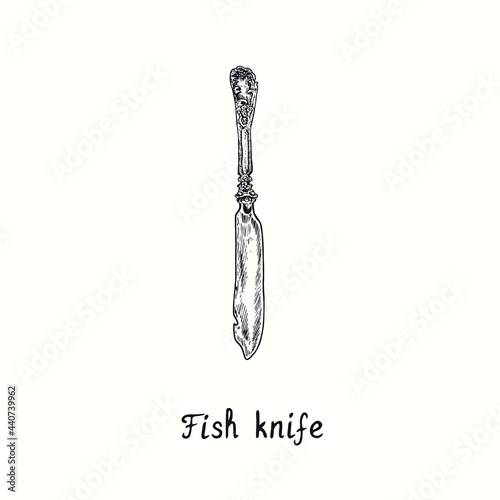 Fish knife with retro style decor. Ink black and white drawing  woodcut vintage style  illustration