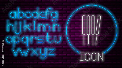 Glowing neon line Aroma sticks, incense, aromas icon isolated on brick wall background. Neon light alphabet. Vector