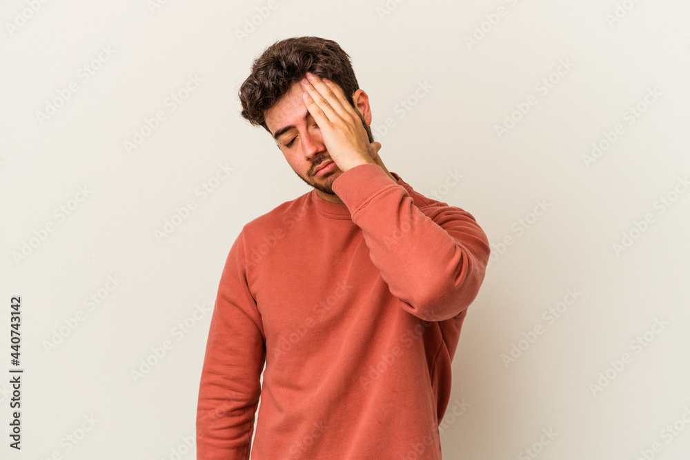 Young caucasian man isolated on white background forgetting something, slapping forehead with palm and closing eyes. Young caucasian man isolated on white background forgetting something, slapping forehead with palm and closing eyes.