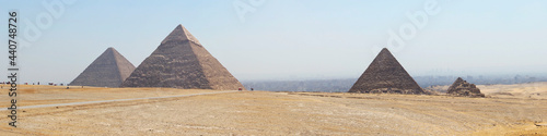 Archaeological complex of the Great Egyptian Pyramids is located on the Giza plateau. Pyramids of Chephren Khafra, Cheops Khufu and Mikerina Menkaura and the satellite pyramids. Cairo, Egypt.