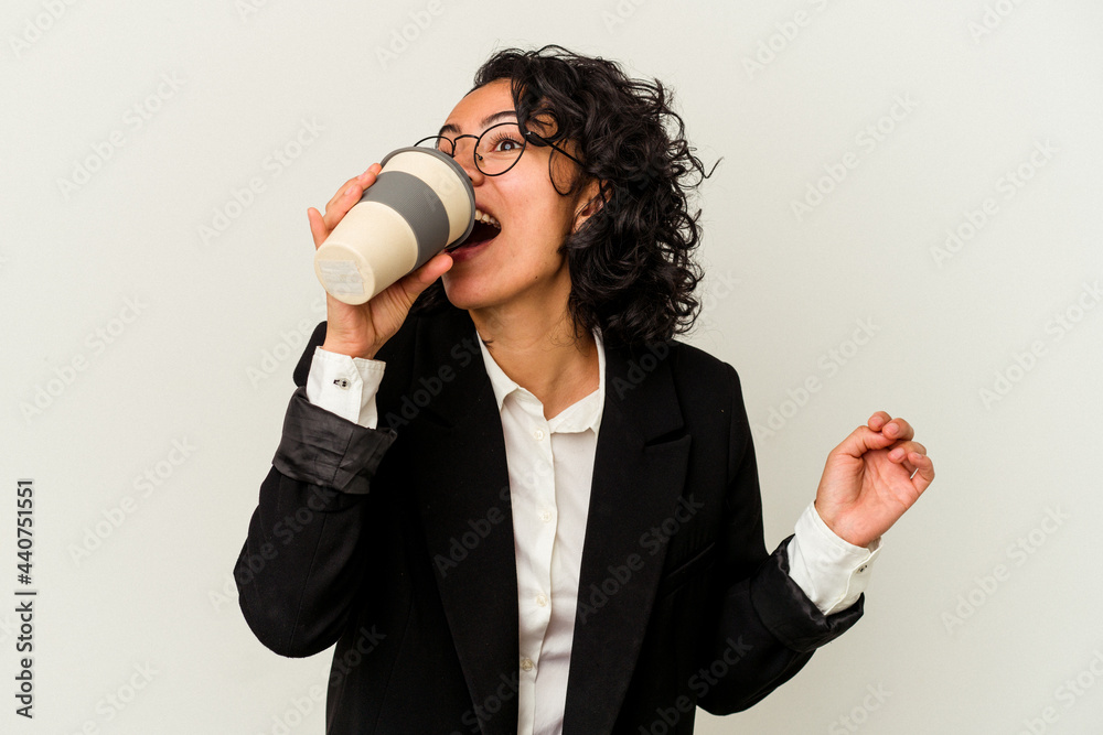 Obraz premium Young caucasian business woman drinking a coffee
