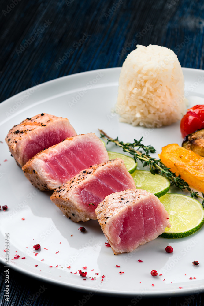Medium grilled tuna steak with vegetables Medium grilled tuna steak with vegetables