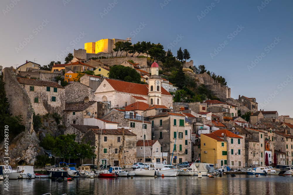 Beautiful old city of Sibenik, view of the town center at sunset. Croatia.
