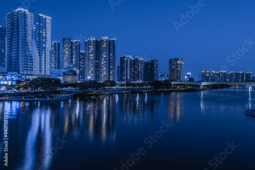 Night view of buildings on the bank of the Jiaomen River in Nansha District  Guangzhou