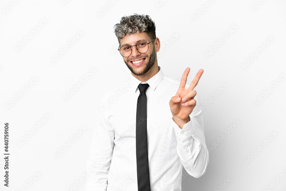 Business caucasian man isolated on white background smiling and showing victory sign Business caucasian man isolated on white background smiling and showing victory sign