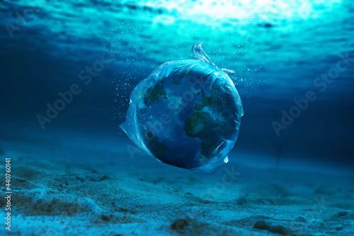Fototapeta Naklejka Na Ścianę i Meble -   Planet earth in a plastic