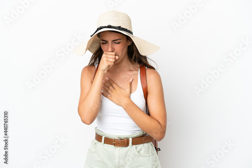 Young caucasian woman wearing a Pamela in summer holidays isolated on white background is suffering with cough and feeling bad © luismolinero