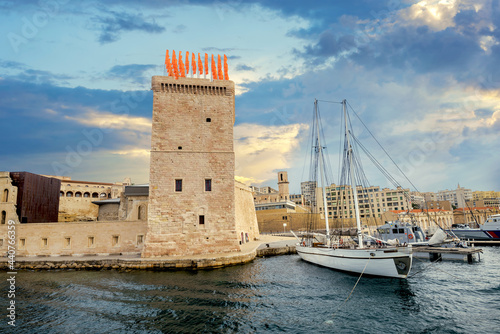 View of watchtower of fort Saint Jean and Vieux Port in harbour of Marseille. France