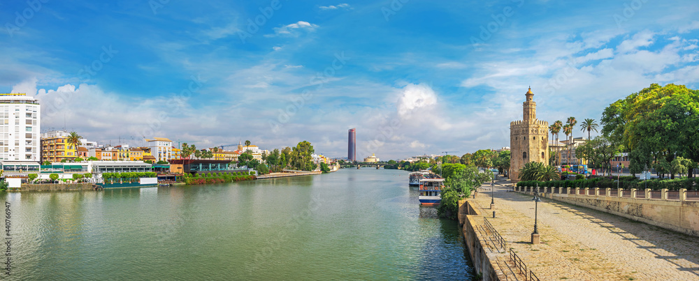 Fototapeta premium Guadalquivir river and Torre del Oro tower (Gold tower) in Seville. Andalusia, Spain