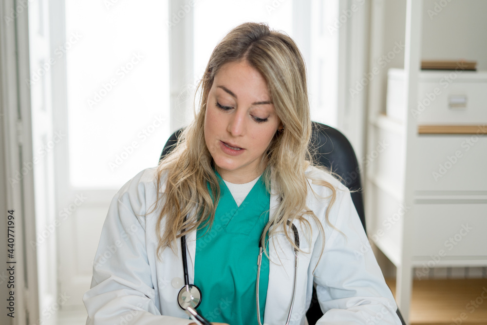 Female doctor interacting with patient in online video call. Screen point of view Female doctor interacting with patient in online video call. Screen point of view
