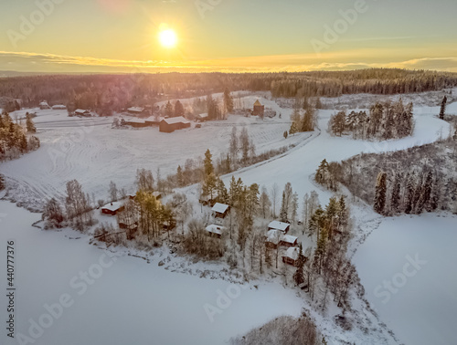 Drone picture of winter fields and cottages