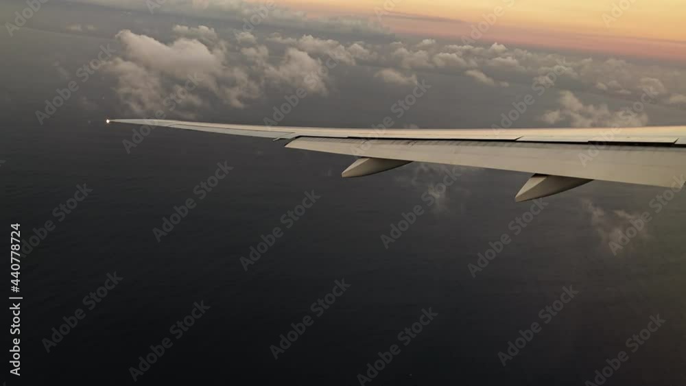 View through a passenger airplane window on a beautiful landscape. View through a passenger airplane window on a beautiful landscape.