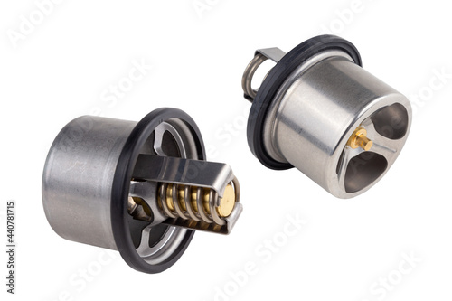 set of two thermostats of the truck engine cooling system. Spare parts on white background