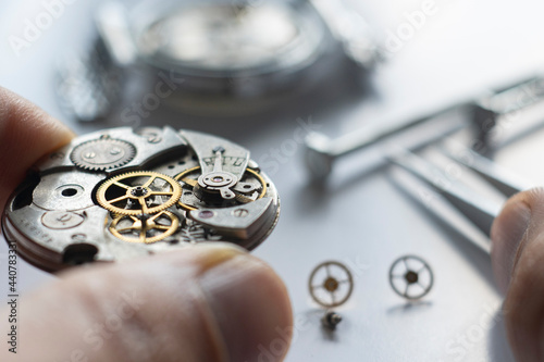Watchmaker repair mechanical watches. Gears repair. Watch repair process