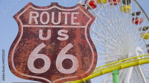 Route 66 signs and the Ferris wheel in the background photo