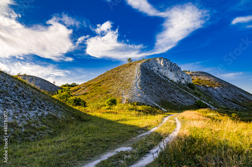 White chalk rocks or mountains or hills in chalk steppe, the Dvorichanskyi National Nature Park reserve in Ukraine, Kharkiv region