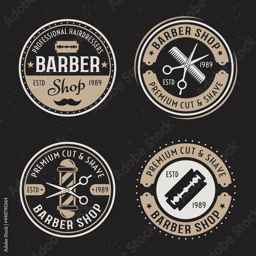 Barber shop set of four vector colored vintage round badges, emblems, labels or logos on dark background