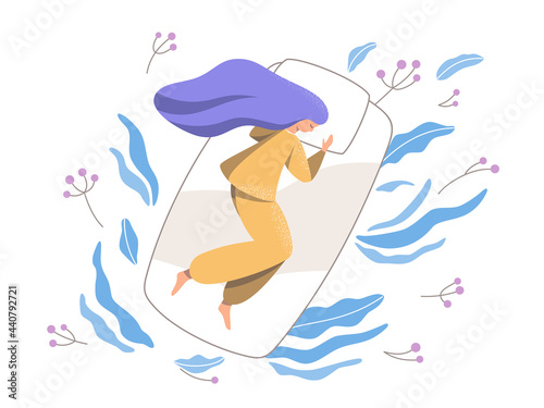 A nice young woman sleeps and has light, lucid dreams.
