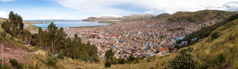 Puno city and Titicaca lake panoramic view from Peru Puno city and Titicaca lake panoramic view from Peru