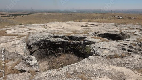 Gobeklitepe, Sanliurfa, Turkey - 15th of June 2021: 4K Digging pit on the way to the Gobekli Tepe archaeological site
 photo