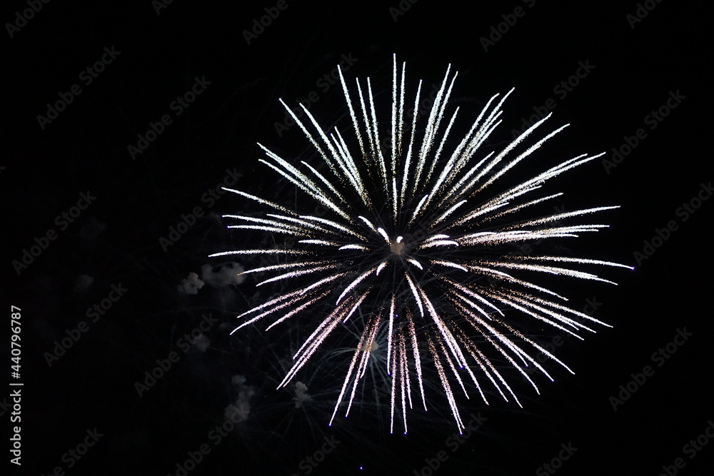 Bright fireworks on dark background for the 4th of July, New Year celebration Bright fireworks on dark background for the 4th of July, New Year celebration