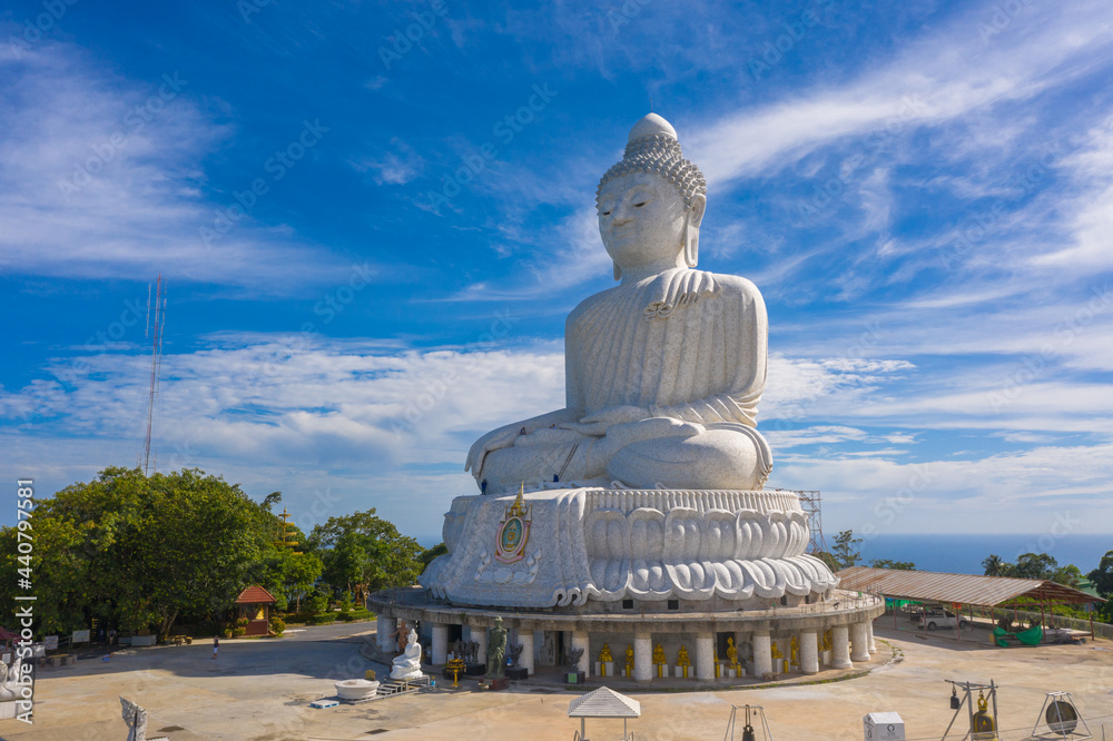 Fototapeta premium aerial view big cleaning on white big Phuket Buddha. white big Phuket Buddha in blue sky..Big Buddha, another tourist attraction of Phuket .that has been quiet during the Covid-19 epidemic.