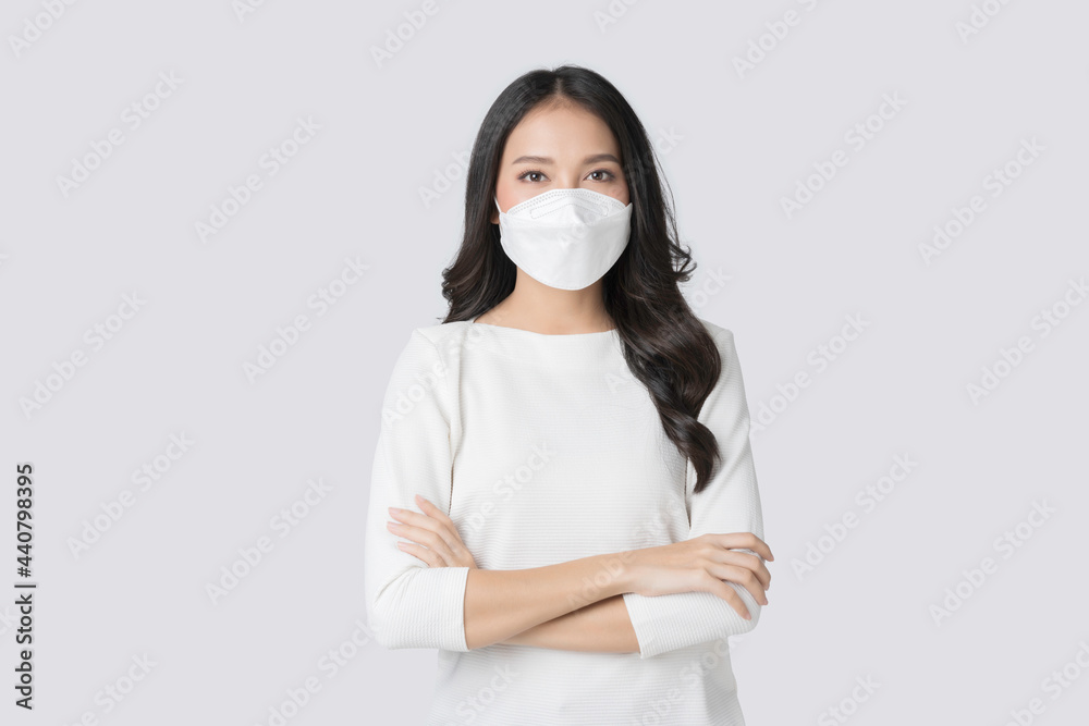 Young Asian woman wearing hygienic mask to prevent infection corona virus Air pollution pm2.5 in isolated on white background Young Asian woman wearing hygienic mask to prevent infection corona virus Air pollution pm2.5 in isolated on white background