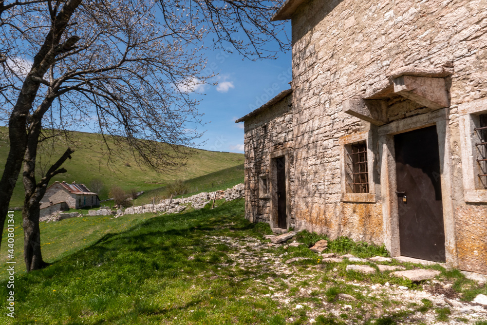 Italian hut in a mountain landscape northern Italy Italian hut in a mountain landscape northern Italy