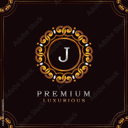 Golden Premium Luxury Mandala Badge Letter J Logo Design. Elegance Ornate Decoration Mandala Badge On Golden Frame .