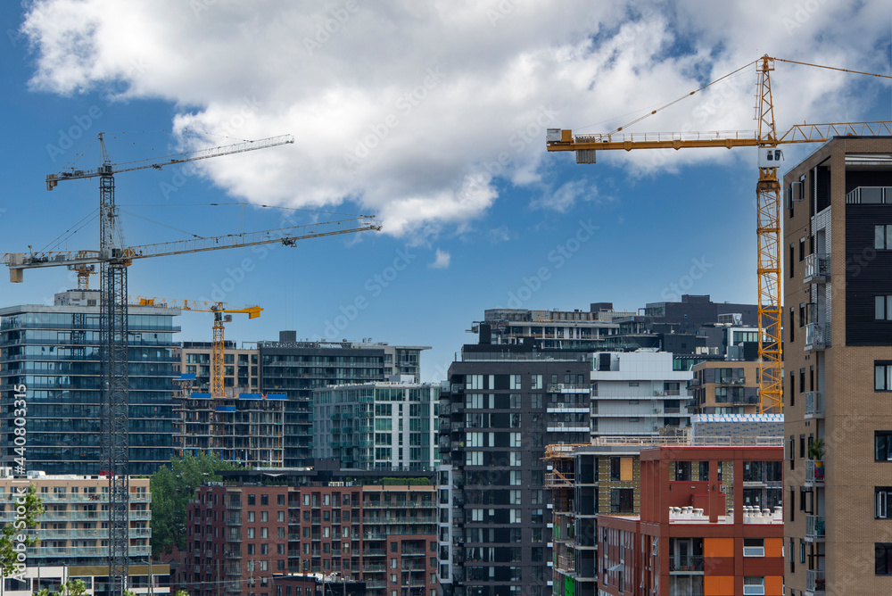 Close-up view of buildings and cranes in the Griffintown district
