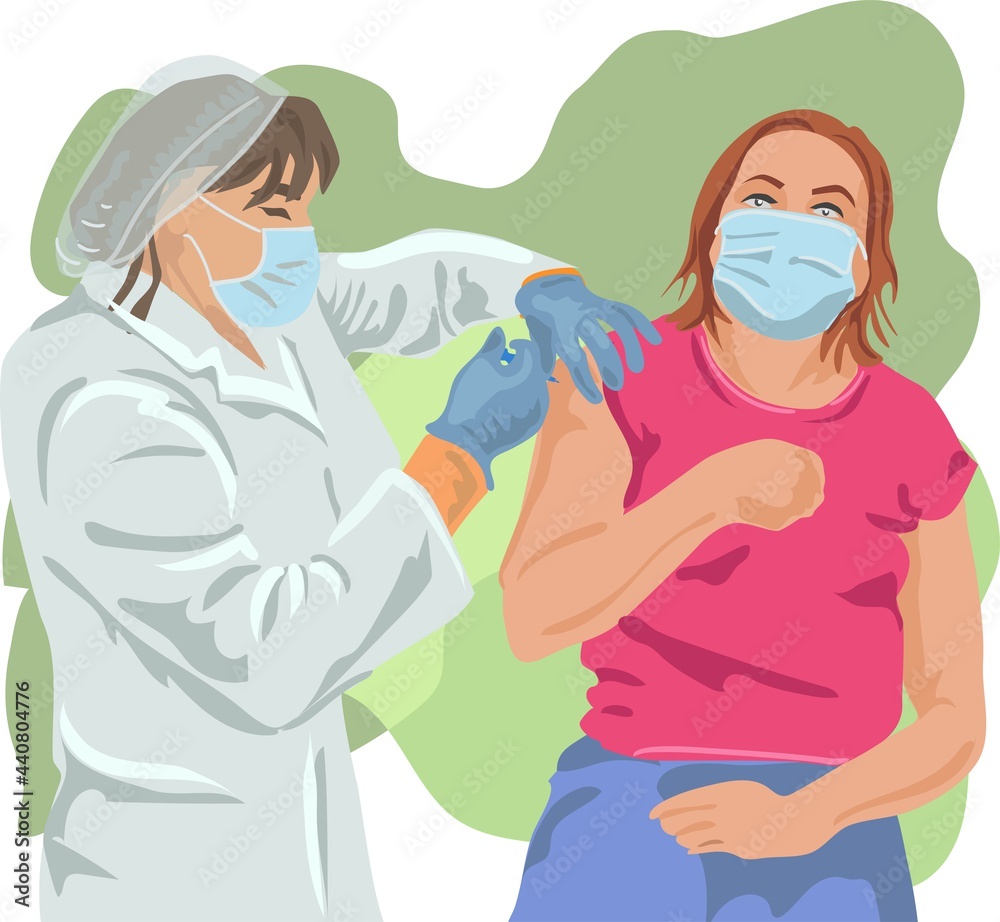Doctor in a mask and robe vaccinates against coronavirus to a masked woman Doctor in a mask and robe vaccinates against coronavirus to a masked woman