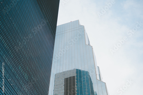 low and wide angle view with high mirror building with sky