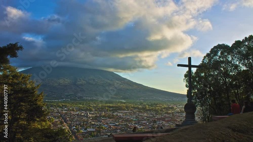 Antigua as viewed from Cerro de la Cruz, with Volcano De Agua in the background. (time-Lapse) photo